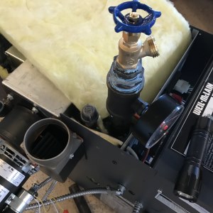 installing a drain valve for a new boiler pressure test