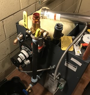 installing piping on hot water boiler return