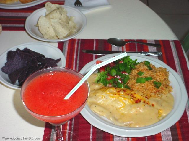 The perfect seafood enchilada meal including, salad chips and beverage